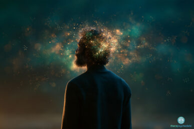 Silhouette d'un homme de dos entouré de particules lumineuses et de molécules, symbole de la dépendance aux psychédéliques.
